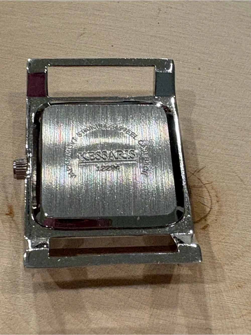 Kessaris silver square face with 6 cloth bands watch in GUC needs new battery